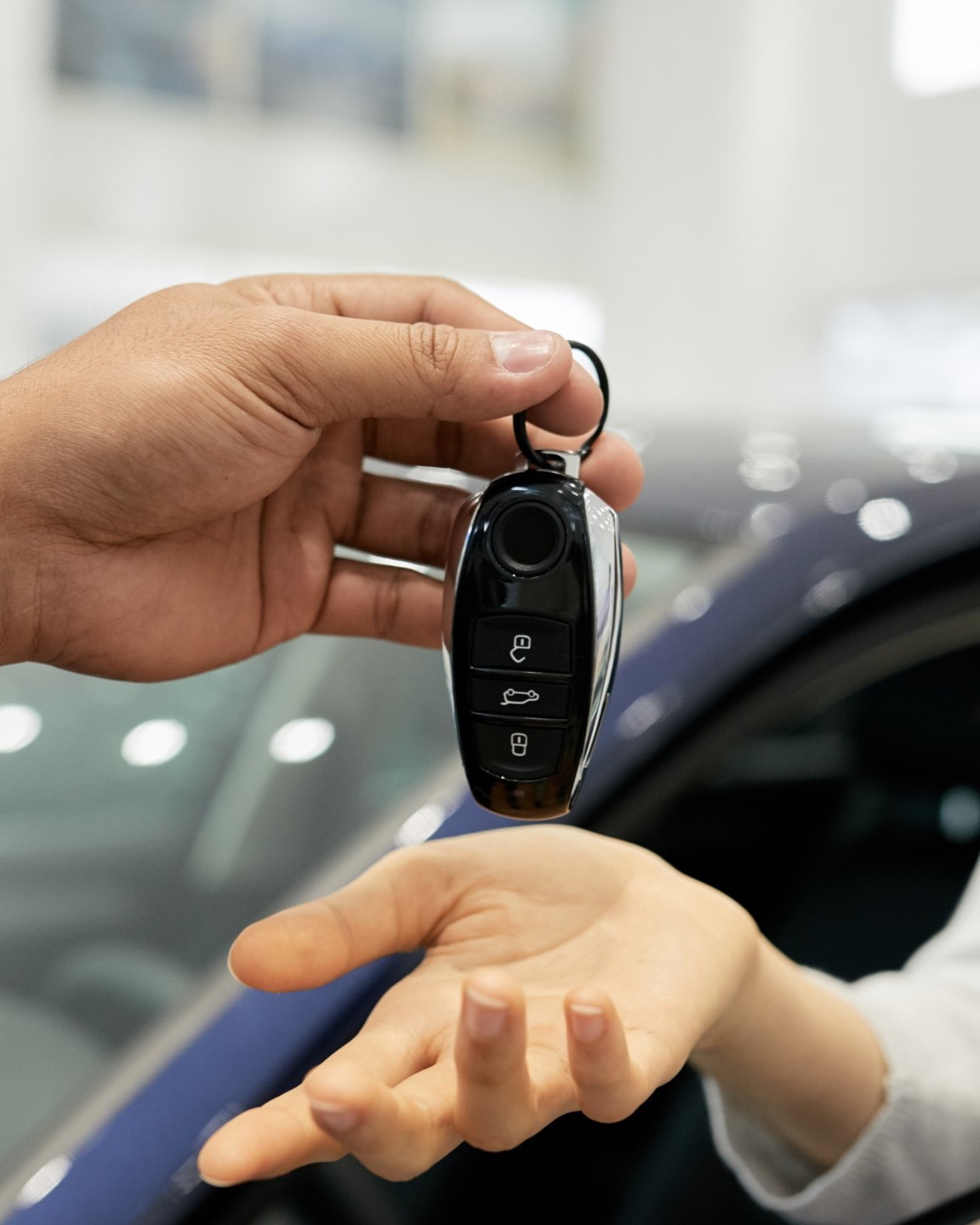 Customer receiving car keys